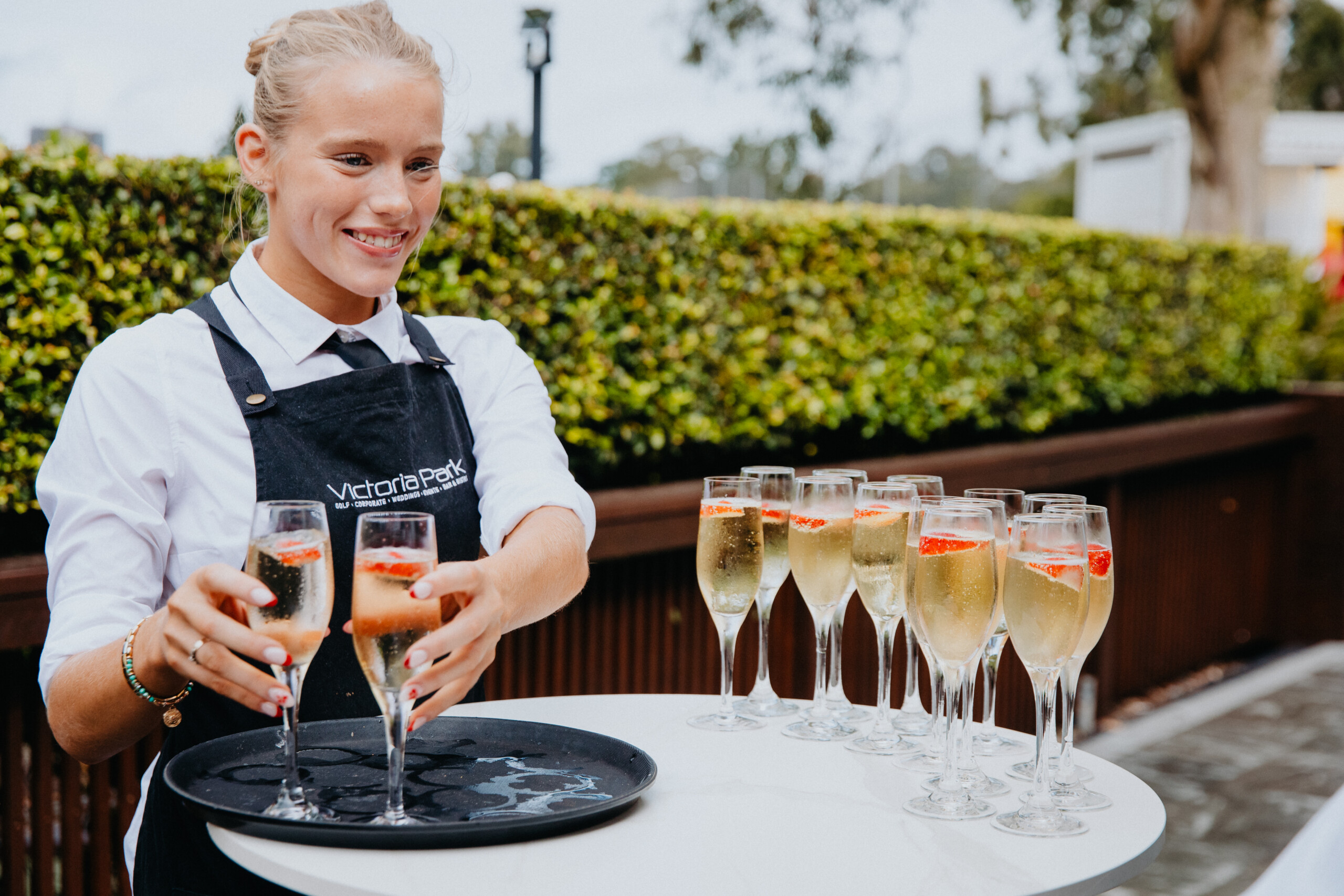 Marquee Functions Staff Serving Champagne