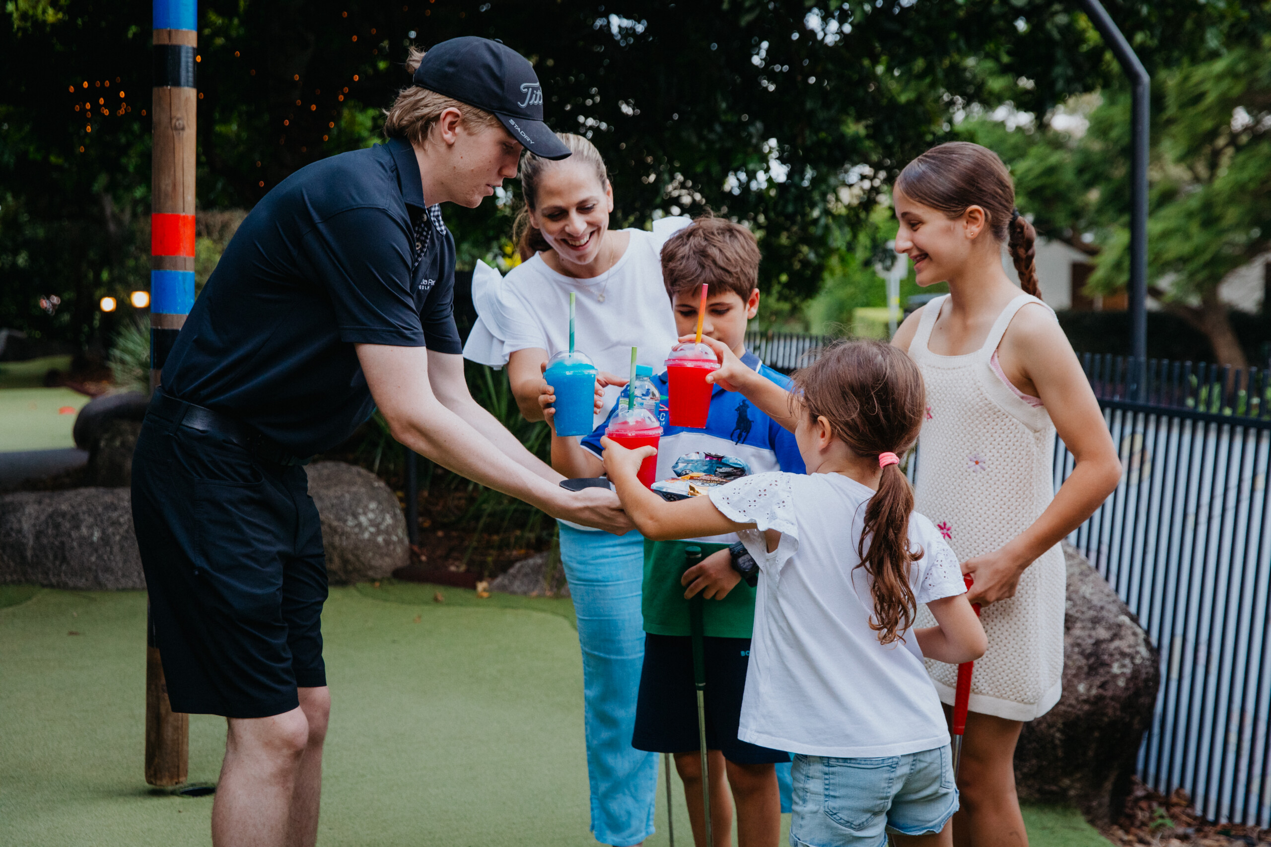 Drinks being delivered on the Putt Putt course